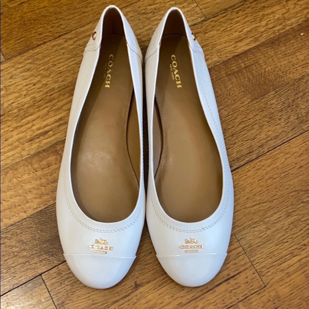NWOT LIGHT PINK COACH FLATS
